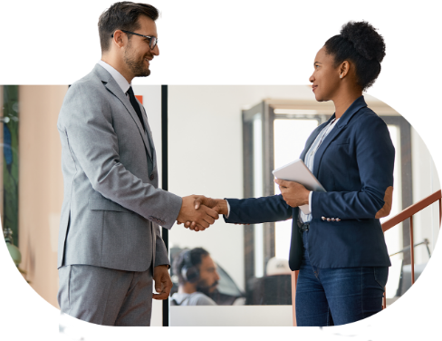 Business associates shaking hands.